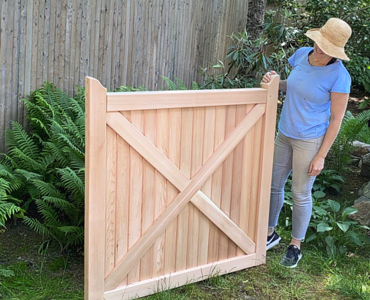 cedar fence gate with human